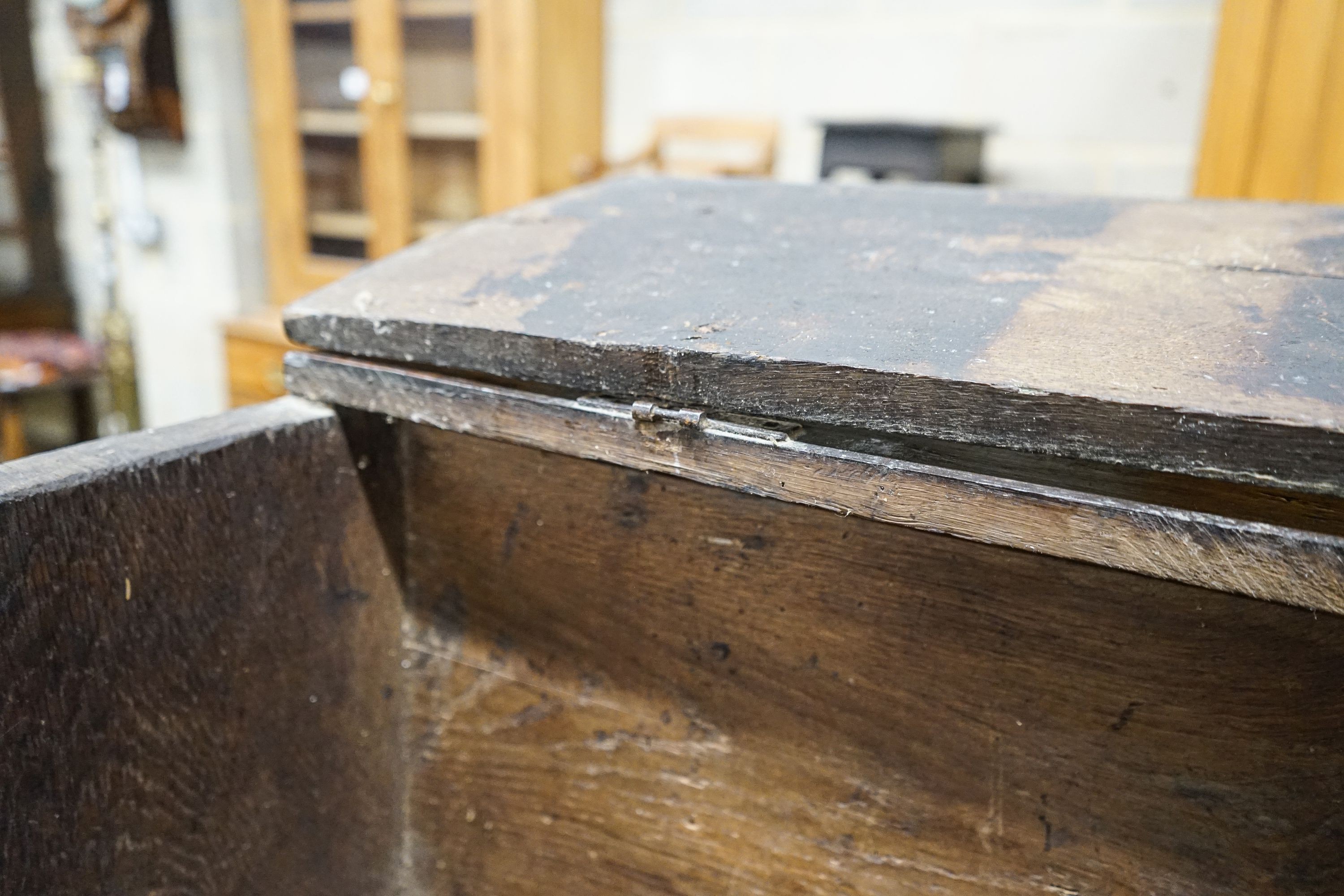 A 17th century oak and elm six plank coffer, width 104cm, depth 36cm, height 54cm